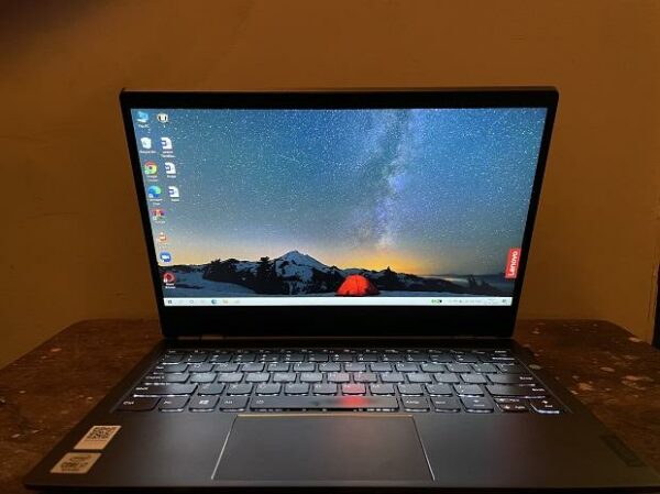 A subsequent screen close to the console, Spilled Lenovo Thinkbook Plus picture shows
