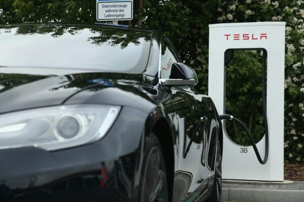 As electric vehicle conveyances take off, Tesla sees record benefit